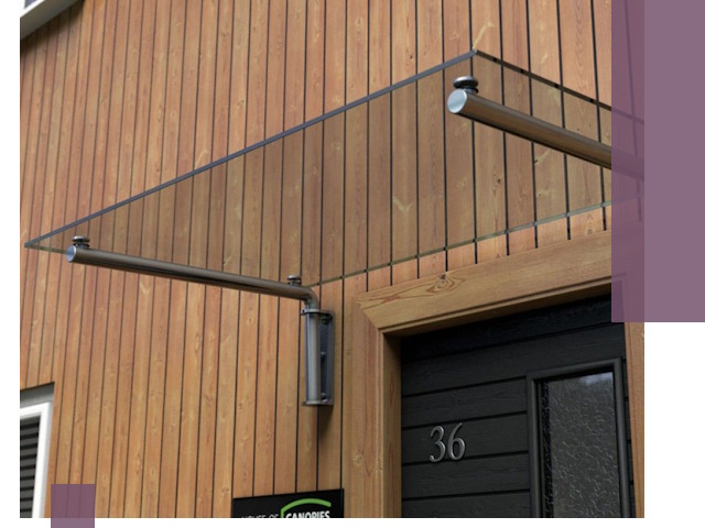 Стеклянные козырьки на входы и фасады в Новокуйбышевске